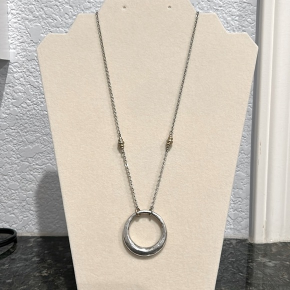 Silver and gold colored circle pendant necklace. Adjustable to 2 lengths. - Picture 1 of 6